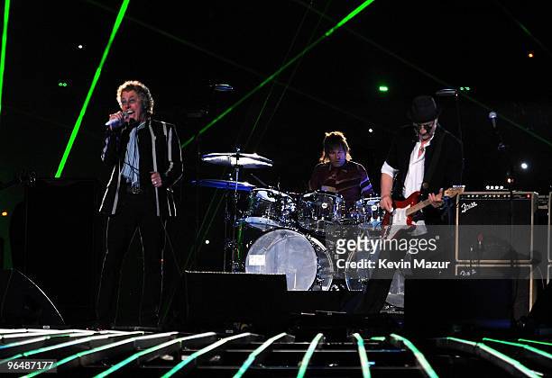 Musicians Roger Daltrey, Zak Starkey and Pete Townshend of The Who perform onstage during the Super Bowl XLIV Halftime Show at the Sun Life Stadium...