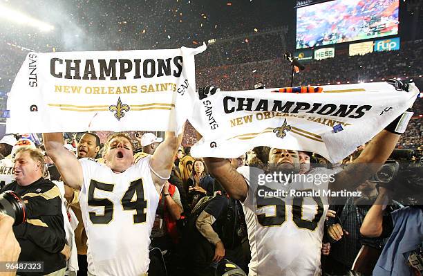Troy Evans and Marvin Mitchell of the New Orleans Saints celebrate at the end of Super Bowl XLIV on February 7, 2010 at Sun Life Stadium in Miami...