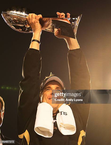 Head coach Sean Payton of the New Orleans Saints holds up the Vince Lombardi Trophy after defeating the Indianapolis Colts during Super Bowl XLIV on...