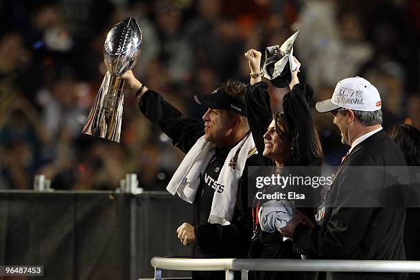 Head coach Sean Payton of the New Orleans Saints holds up the Vince Lombardi Trophy after defeating the Indianapolis Colts during Super Bowl XLIV on...