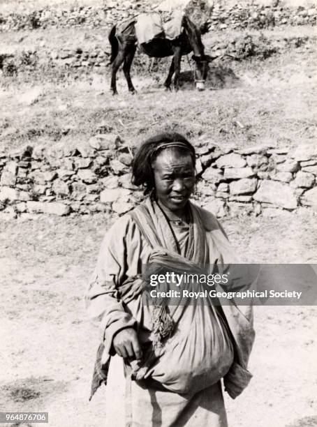Khampa woman from East Tibet, Bhutan, 1933.