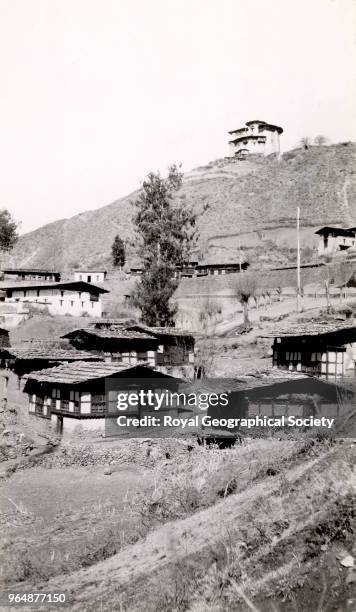 Picquet tower overlooking Paro Dzong, Built in 1646 the 'Paro Dzong' stands in the beautiful Paro Valley on the foundations of an old monastery. This...