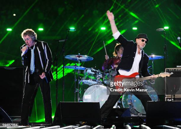 Musicians Roger Daltrey, Zak Starkey and Pete Townshend of The Who perform onstage during the Super Bowl XLIV Halftime Show at the Sun Life Stadium...