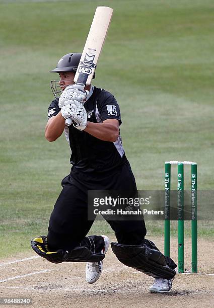 Ross Taylor of New Zealand drives the ball away for four runs during the second One Day International Match between New Zealand and Bangladesh at...