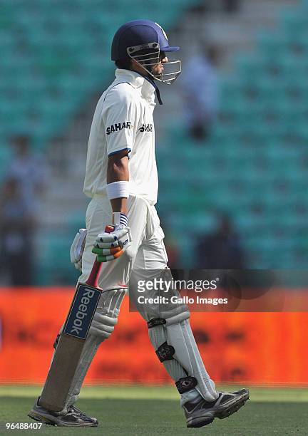 Gautam Gambhir of India leaves the field after being dismissed by Morne Morkel of South Africa for 12 runs during day three of the First Test between...