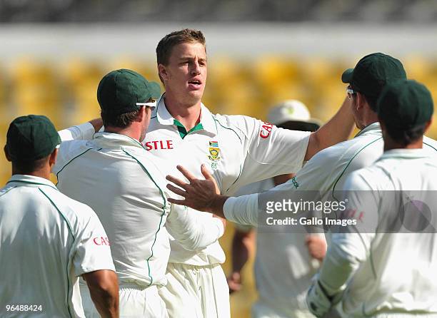 Morne Morkel of South Africa celebrates the wicket of Gautam Gambhir of India during day three of the First Test between India and South Africa at...
