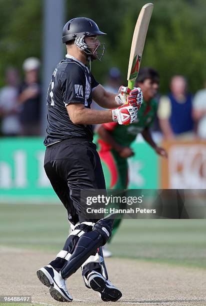 Daniel Vettori of New Zealand hits the winning runs during the second One Day International Match between New Zealand and Bangladesh at University...