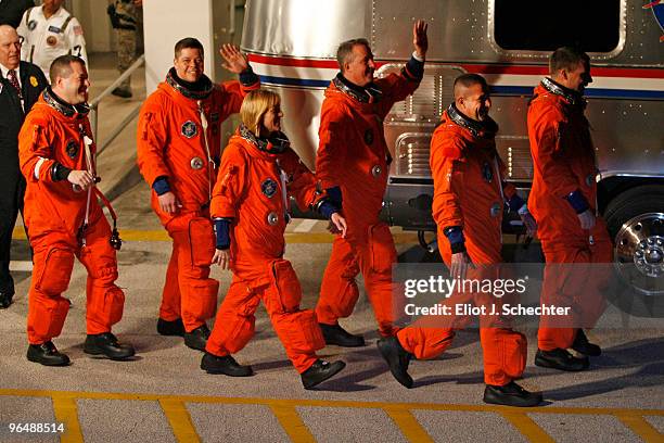 Space Shuttle Endeavour astronauts mission specialists Robert Behnken, Nicholas Patrick, Stephen Robinson, and Kathryn Hire, with pilot Terry Virts...