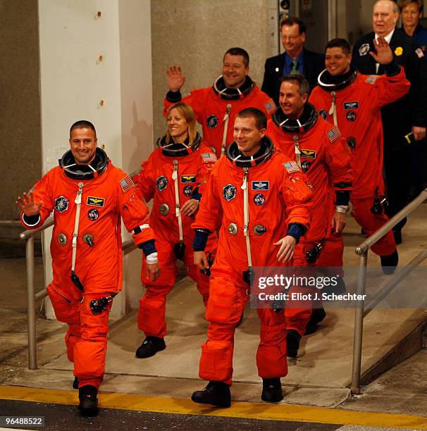 Space Shuttle Endeavour astronauts mission specialists Robert Behnken, Nicholas Patrick, Stephen Robinson, and Kathryn Hire, with pilot Terry Virts...