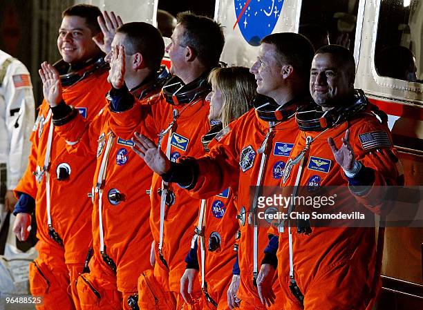 Space Shuttle Endeavour astronauts mission specialists Robert Behnken, Nicholas Patrick, Stephen Robinson, and Kathryn Hire, with pilot Terry Virts...