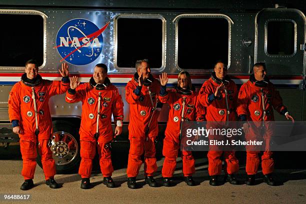 Space Shuttle Endeavour astronauts mission specialists Robert Behnken, Nicholas Patrick, Stephen Robinson, and Kathryn Hire, with pilot Terry Virts...