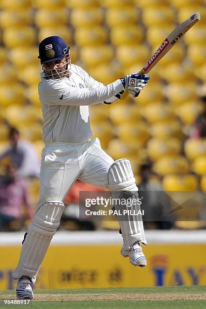 Indian cricketer Virender Sehwag plays a shot on the third day of the first cricket test match between India and South Africa in Nagpur on February...