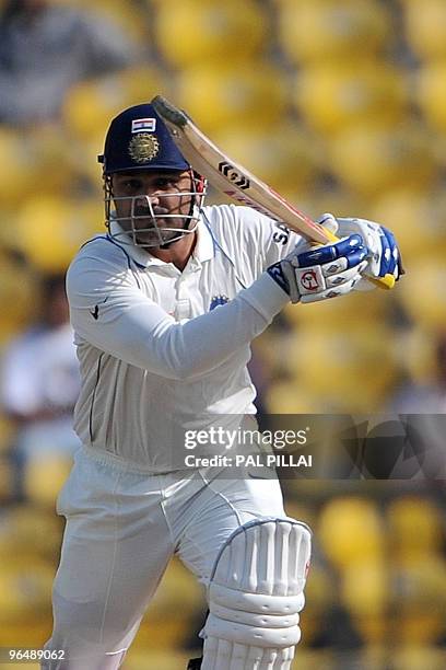 Indian cricketer Virender Sehwag plays a shot on the third day of the first cricket Test match between India and South Africa in Nagpur on February...