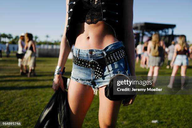 Coachella guest wearing a Prada bag during day 2 of the 2018 Coachella Valley Music & Arts Festival Weekend 1 on April 14, 2018 in Indio, California.