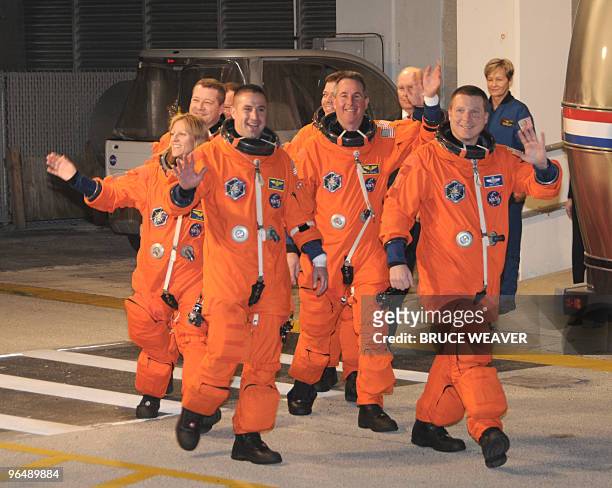 Space shuttle Endeavour crew members commander George Zamka, pilot Terry Virts, Kathryn Hire, Stephen Robinson, Nicholas Patrick, and Robert Behnken...