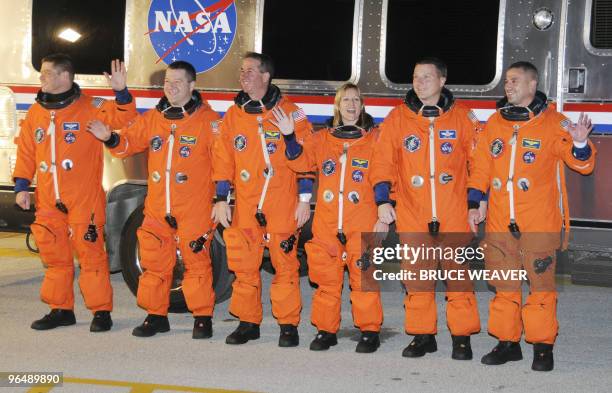 Space shuttle Endeavour crew members Robert Behnken, Nicholas Patrick, Stephen Robinson, Kathryn Hire, pilot Terry Virts and commander George Zamka...