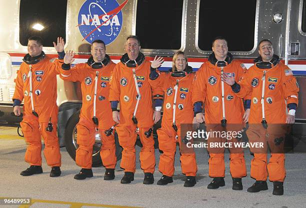 Space shuttle Endeavour crew members Robert Behnken, Nicholas Patrick, Stephen Robinson, Kathryn Hire, pilot Terry Virts and commander George Zamka...