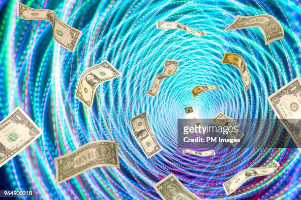 money flowing through tunnel of lights - image manipulation stock pictures, royalty-free photos & images