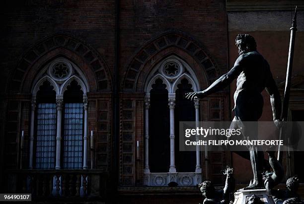 The statue of Poseidon in central Bologna's Piazza Grande is seen on February 7, 2010. AFP PHOTO / Filippo MONTEFORTE