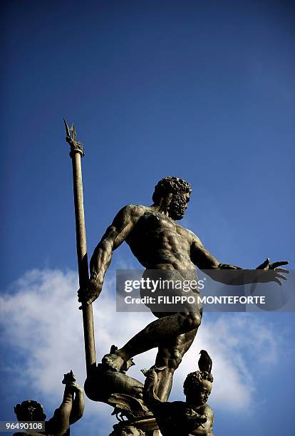 The statue of Poseidon in central Bologna's Piazza Grande is seen on February 7, 2010. AFP PHOTO / Filippo MONTEFORTE
