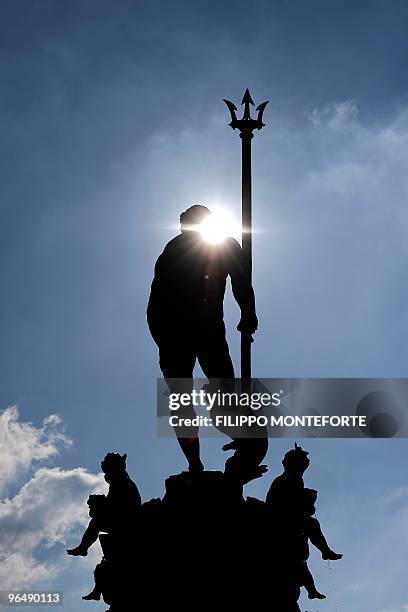 The statue of Poseidon in central Bologna's Piazza Grande is seen on February 7, 2010. AFP PHOTO / Filippo MONTEFORTE