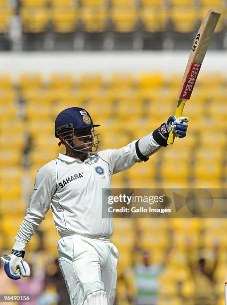 Virender Sehwag of India celebrates his 100 during the day 3 of the 1st test between India and South Africa from Vidarbha Cricket Association Ground...