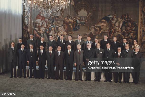 View of members of the new French Government posed together with President Georges Pompidou at the Elysee Palace in France on 7th July 1972. Back row...