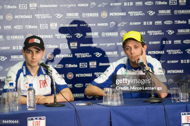 Jorge Lorenzo of Spain and Valentino Rossi of Italy look on during the presentation of Fiat Yamaha Team Valentino Rossi of Italy speaks during the...