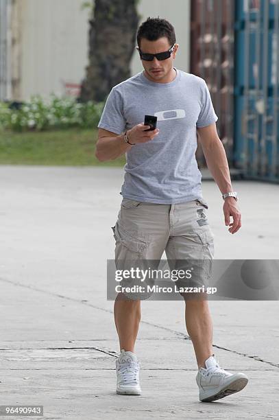 Randy De Puniet of France and LCR Team Honda looks on during the first day of the MotoGP test at Sepang International Circuit, near Kuala Lumpur,...