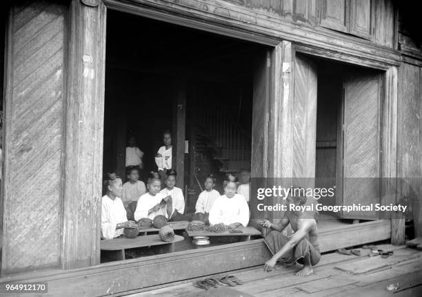 Rolling Cheroots, This image was taken circa 1890-99, Myanmar, 1890.