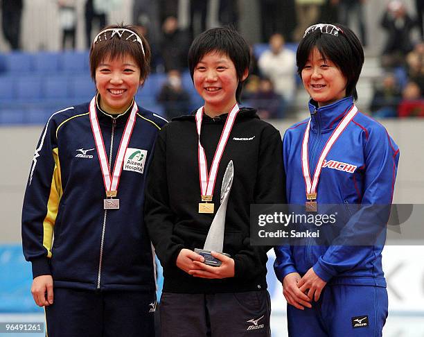 3rd place Nao Kodaira, winner Miho Takagi and 2nd place Maki Tabata on the podium after the Women's 1500m during the Speed Skating Vancouver Olympic...