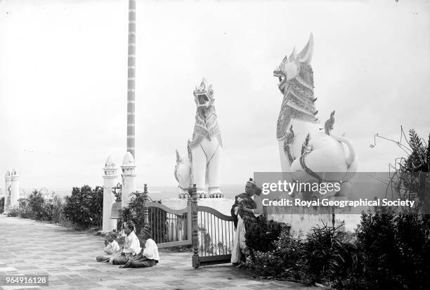 Praying by temple gate', This image was taken circa 1890-99, Myanmar, 1890.