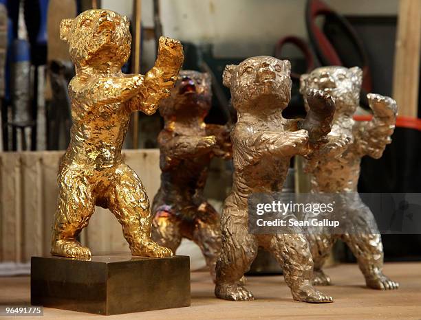 Berlinale Golden Bear stands among semi-finished Berlinale Bears at the Hermann Noack casting foundry on February 8, 2010 in Berlin, Germany. The...