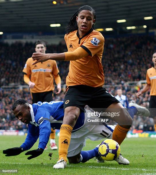 Birmingham City's Cristian Benitez is tackled by Wolverhampton Wanderers Michael Mancienne during an English Premier League football match at St....