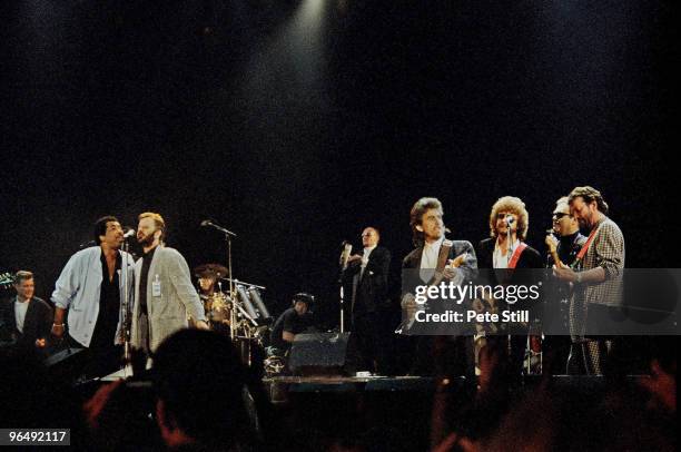 Ben E King, Ringo Starr, Ray Cooper , George Harrison, Jeff Lynne, Elton John and Eric Clapton perform on stage, at Wembley Arena for The Princes...