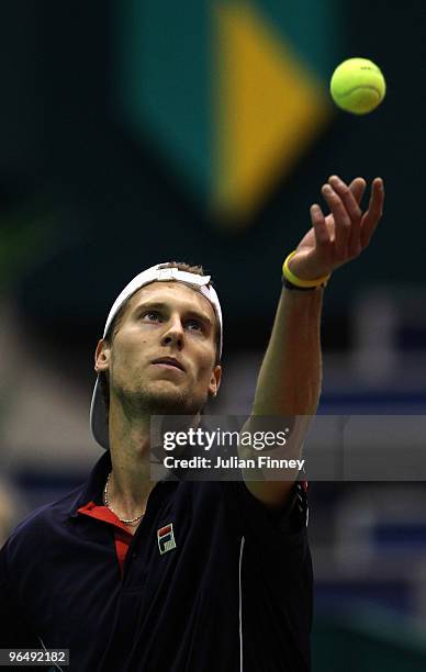 Andreas Seppi of Italy serves to Stephane Bohli of Switzerland during day one of the ABN AMBRO World Tennis Tournament on February 8, 2010 in...