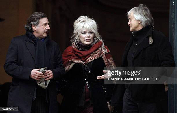 French actor Daniel Auteuil, French singer Armande Altaï and Dutch singer Dave leave the Saint-Roch church following the funeral ceremony for French...