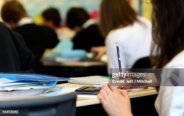 Pupils at Williamwood High School attend a math class on February 5, 2010 in Glasgow, Scotland. As the UK gears up for one of the most hotly...