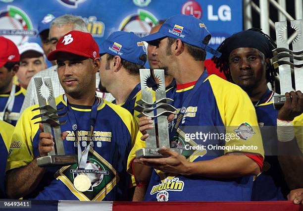 Dominican Republic's Leones del Escogido players celebrate winning the Caribbean Series 2010 after the match against Leones del Caracas at Guatamare...