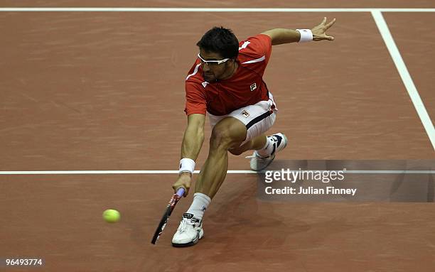 Janko Tipsarevic of Serbia in action against Florian Mayer of Germany during day one of the ABN AMBRO World Tennis Tournament on February 8, 2010 in...