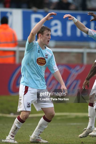 John Johnson of Northampton Town celebrates after scoring his sides goal during the Coca Cola League Two Match between Dagenham & Redbridge and...