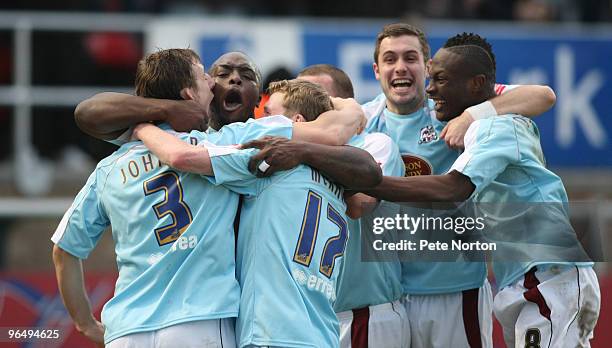 Northampton Town players celebrate after John Johnson had scored their sides goal during the Coca Cola League Two Match between Dagenham & Redbridge...