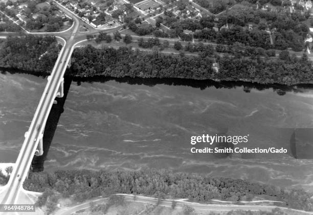 Aerial view of the Franklin Avenue Bridge on the Mississippi River, Minneapolis, Minnesota, June 7, 1933. Image courtesy Centers for Disease Control...