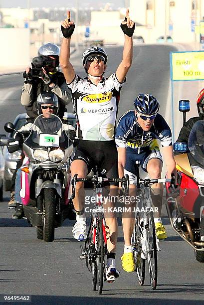Topsport team rider Geert Steurs of Belgium celebrates finishing second in the second stage of the Tour of Qatar cycling race on February 8, 2010....