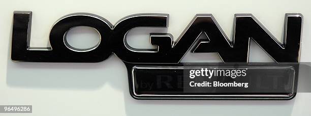 Logan logo is seen on a Renault Dacia automobile at a Renault SA showroom in Paris, France, on Monday, Feb. 8, 2010. Renault SA and Japanese...