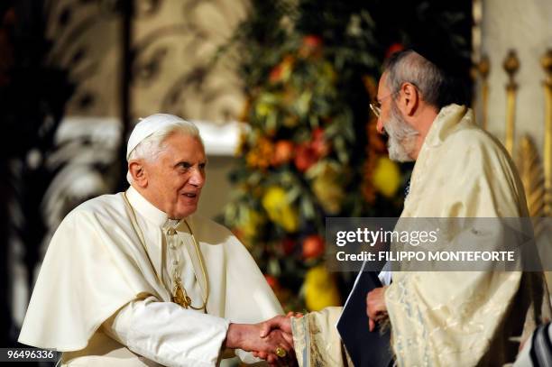 Pope Benedict XVI shakes hands with chief Rabbi Riccardo Di Segni in Rome's main Synagogue on January 17, 2010. Pope Benedict XVI paid homage to more...