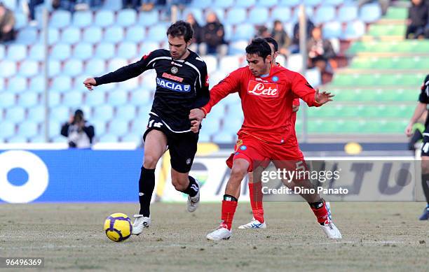 Paolo Sammarco of Udinese competes with Michele Pazienza of Napoli during the Serie A match between Udinese and Napoli at Stadio Friuli on February...