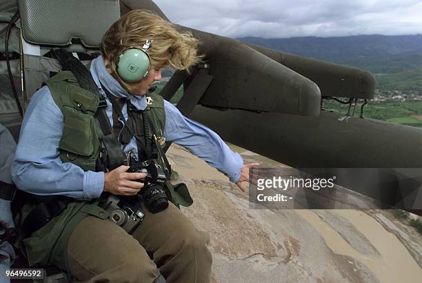 Tipper Gore, wife of US Vice President Al Gore looks over the receding Choluteca River near the Honduran capital of Tegucigalpa, as she inspects the...