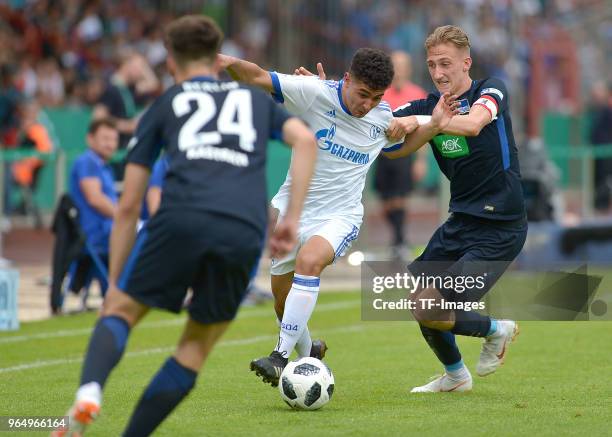 Mateo Kastrati of Hertha, Muenir Mercan of Schalke and Florian Krebs of Hertha battle for the ball during the German A Juniors Championship final...