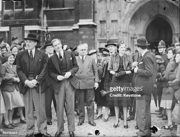 Anthony Eden , Ernest Bevin , Beatrice Eden and Sir Archibald Sinclair outside Westminster Abbey in London during the National Day of Prayer, 3rd...